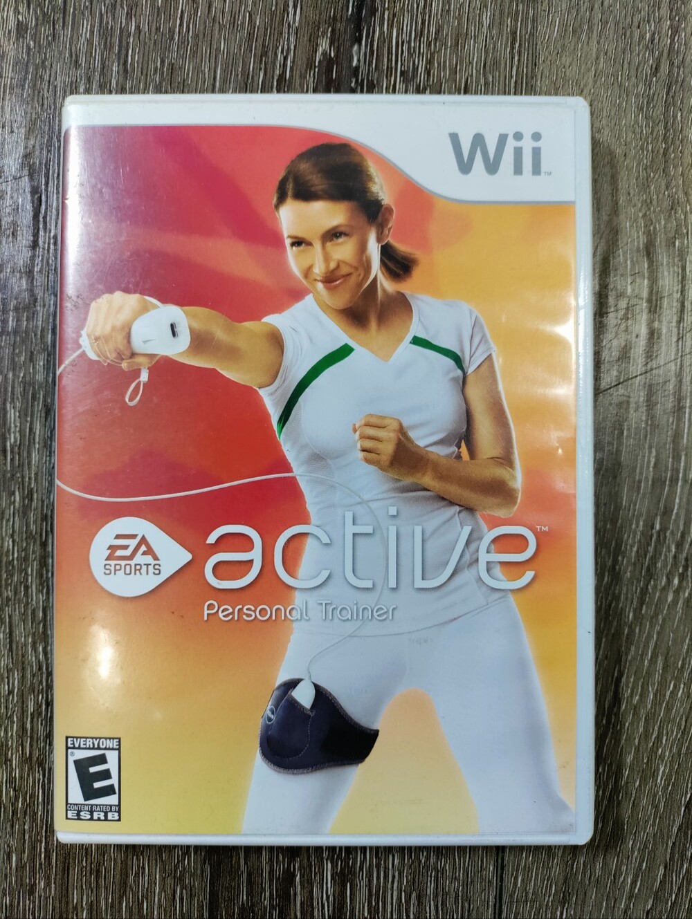 Nintendo Wii Active: EA Sports Personal Trainer - White, Green, Orange